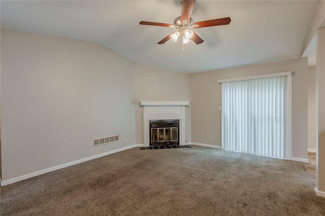 6200 Beaver Creek Trl, Atlanta, GA 30349 - unfurnished living room featuring a ceiling fan, lofted ceiling, a glass covered fireplace, and carpet floors