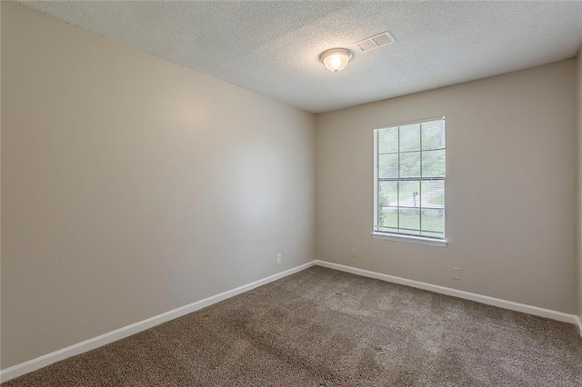 6200 Beaver Creek Trl, Atlanta, GA 30349 - carpeted spare room with baseboards and a textured ceiling