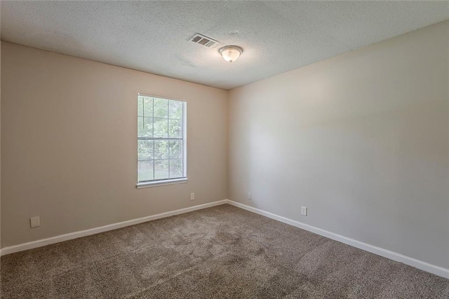 6200 Beaver Creek Trl, Atlanta, GA 30349 - carpeted spare room featuring a textured ceiling and baseboards