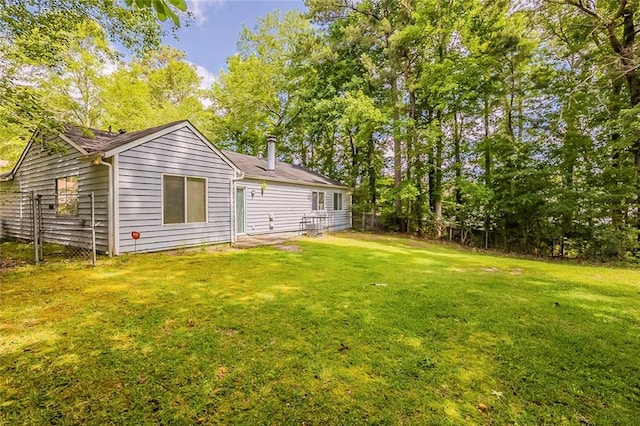 6200 Beaver Creek Trl, Atlanta, GA 30349 - rear view of house with view of wooded area
