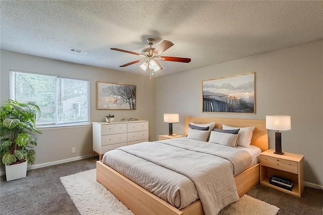 6200 Beaver Creek Trl, Atlanta, GA 30349 - carpeted bedroom featuring ceiling fan and a textured ceiling