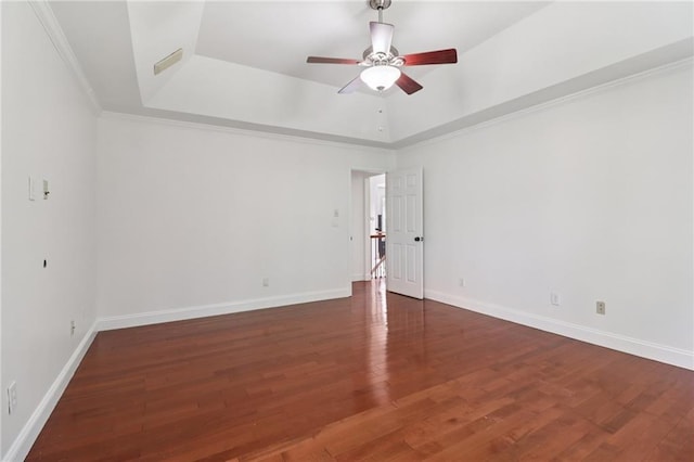 4046 Water Hole Ct, Douglasville, GA 30135 - unfurnished room with a tray ceiling, a ceiling fan, and wood finished floors
