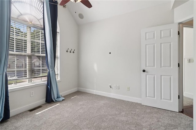 4046 Water Hole Ct, Douglasville, GA 30135 - carpeted empty room with ceiling fan and vaulted ceiling