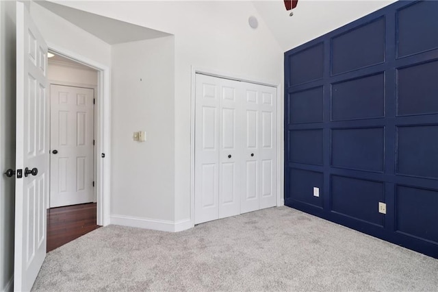 4046 Water Hole Ct, Douglasville, GA 30135 - unfurnished bedroom featuring carpet floors, a closet, vaulted ceiling, and a ceiling fan