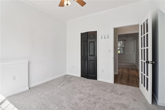 4046 Water Hole Ct, Douglasville, GA 30135 - unfurnished bedroom featuring carpet flooring, crown molding, and ceiling fan