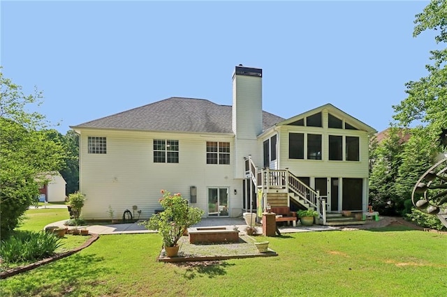 4046 Water Hole Ct, Douglasville, GA 30135 - back of property featuring a patio, a yard, a chimney, and stairway