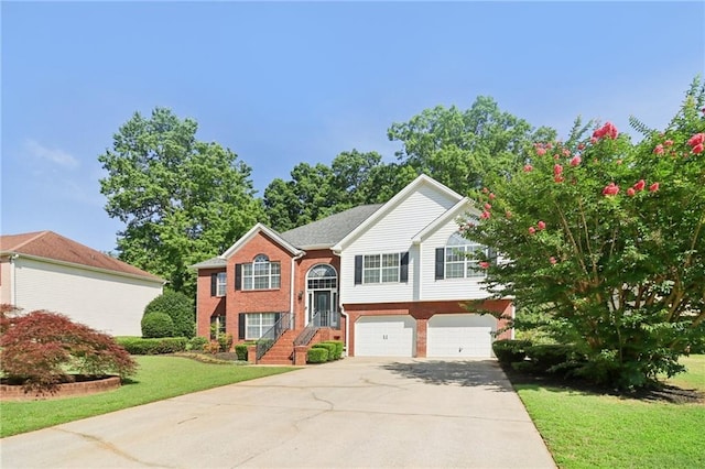 4046 Water Hole Ct, Douglasville, GA 30135 - bi-level home featuring concrete driveway, an attached garage, brick siding, and a front lawn