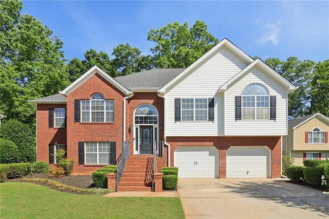 4046 Water Hole Ct, Douglasville, GA 30135 - raised ranch with brick siding, a garage, driveway, and a front lawn