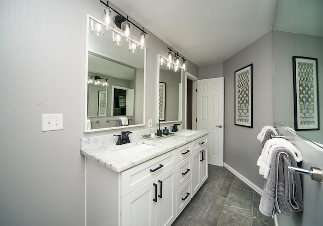 1261 Lavista Rd Unit N4, Atlanta, GA 30324 - bathroom with double vanity and baseboards