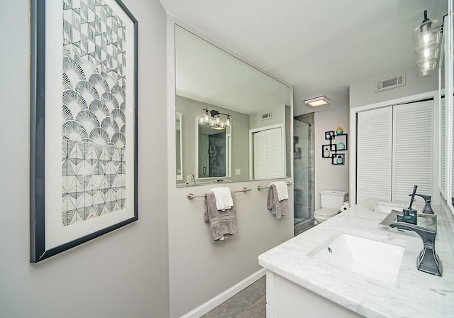 1261 Lavista Rd Unit N4, Atlanta, GA 30324 - bathroom featuring a shower stall, baseboards, and double vanity