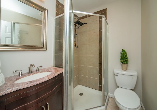 1261 Lavista Rd Unit N4, Atlanta, GA 30324 - bathroom featuring a stall shower, toilet, vanity, and tile patterned flooring