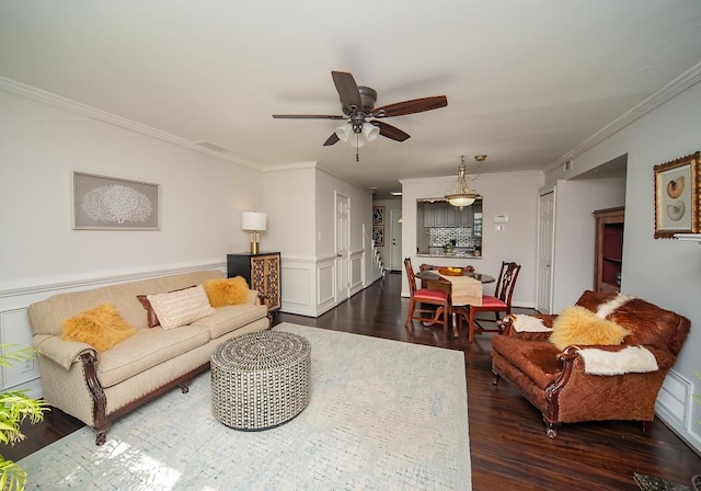 1261 Lavista Rd Unit N4, Atlanta, GA 30324 - living room featuring dark wood finished floors, ceiling fan, ornamental molding, and wainscoting