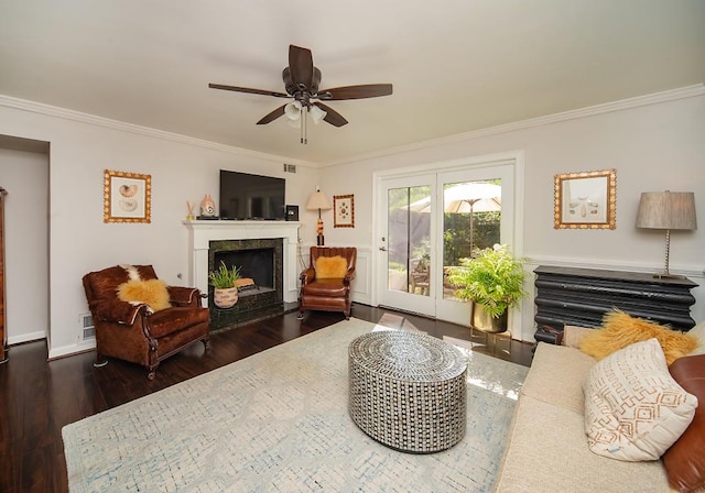 1261 Lavista Rd Unit N4, Atlanta, GA 30324 - living area featuring wood finished floors, ornamental molding, ceiling fan, and a fireplace
