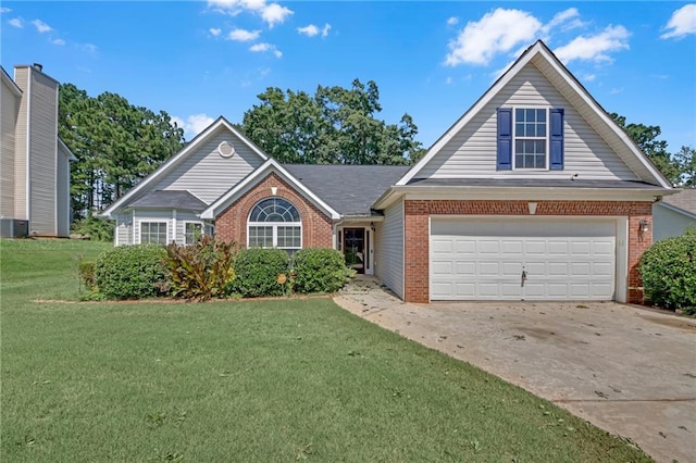 70 Prince Edward Way, Covington, GA 30016 - traditional-style home with brick siding, concrete driveway, a front yard, and a garage