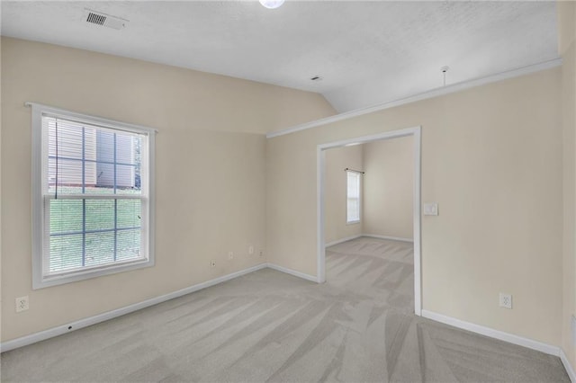 70 Prince Edward Way, Covington, GA 30016 - unfurnished room featuring light colored carpet and lofted ceiling