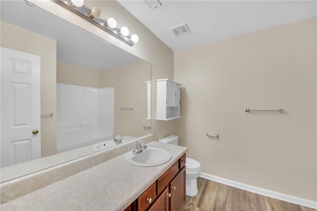 70 Prince Edward Way, Covington, GA 30016 - full bath featuring vanity, wood finished floors, and shower / bathtub combination