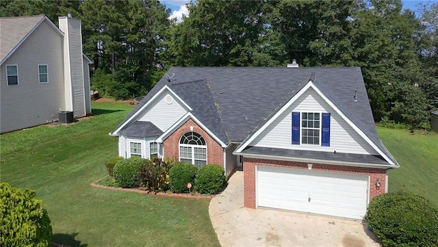 70 Prince Edward Way, Covington, GA 30016 - traditional-style house with brick siding, a garage, a front yard, and driveway
