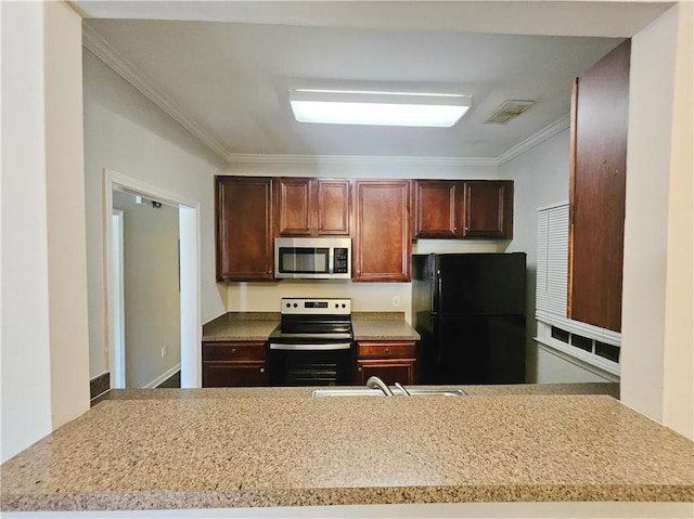 kitchen featuring visible vents, ornamental molding, appliances with stainless steel finishes, a peninsula, and a sink