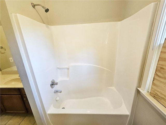 full bathroom with tile patterned flooring, shower / bathing tub combination, and vanity