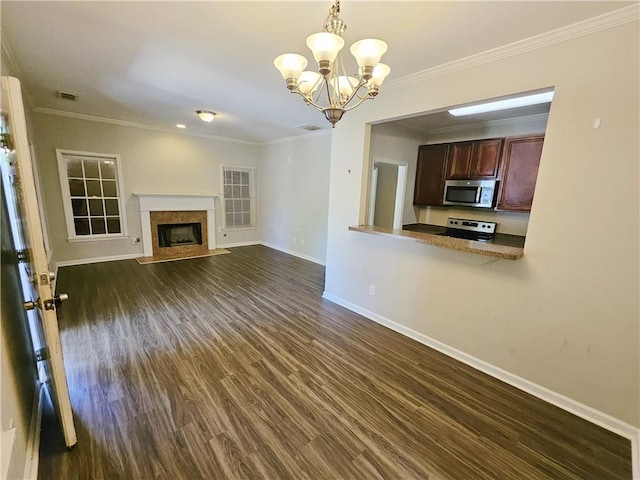 unfurnished living room with a premium fireplace, baseboards, dark wood finished floors, and ornamental molding