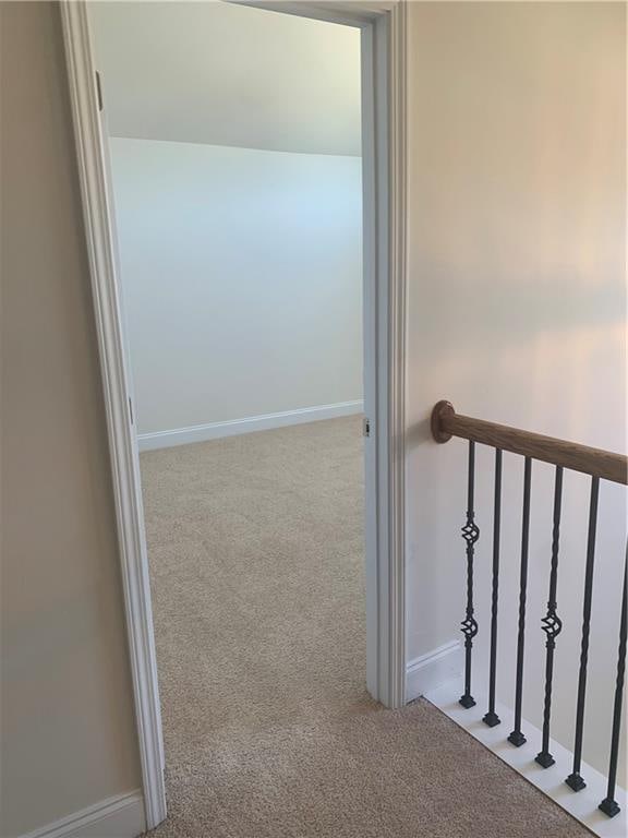 interior space featuring light colored carpet