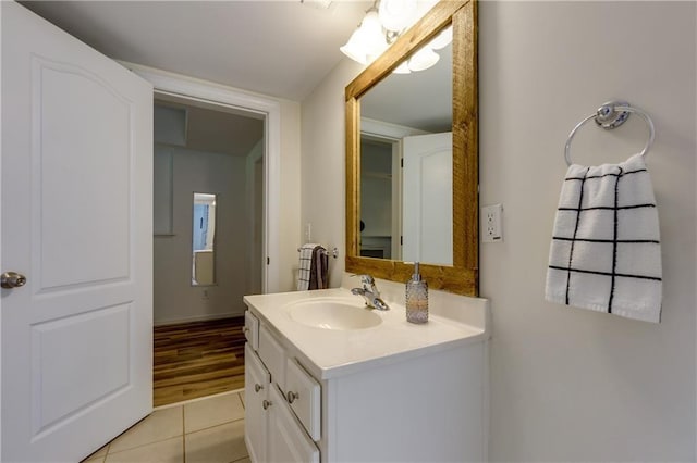 bathroom featuring tile patterned floors and vanity