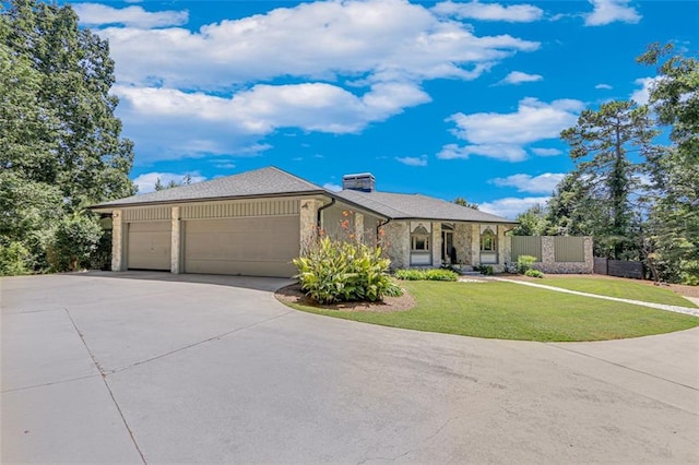 ranch-style home featuring driveway, stone siding, a chimney, an attached garage, and a front yard