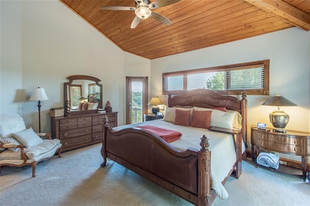 carpeted bedroom featuring vaulted ceiling, a ceiling fan, and wood ceiling