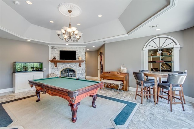 rec room with an inviting chandelier, a tray ceiling, baseboards, visible vents, and recessed lighting