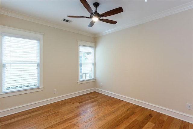 151 Savannah St SE, Atlanta, GA 30316 - empty room with light wood-style flooring, ceiling fan, crown molding, and baseboards