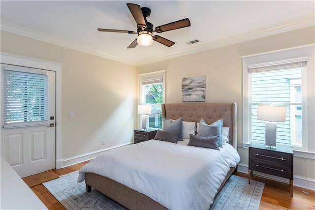 151 Savannah St SE, Atlanta, GA 30316 - bedroom with ornamental molding, light wood-style floors, baseboards, and ceiling fan
