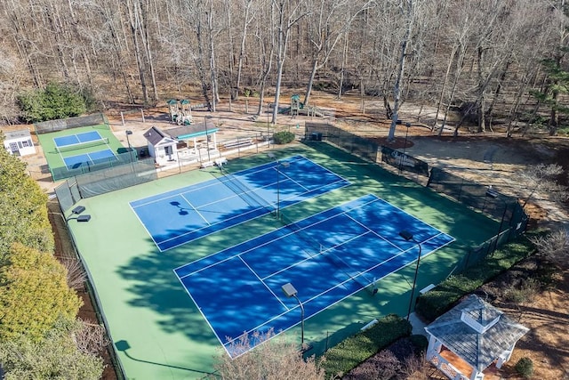 view of sport court with fence