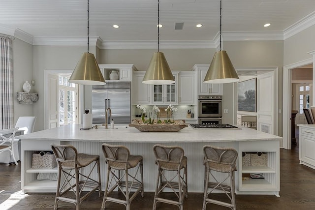 kitchen featuring open shelves, a large island, white cabinetry, and stainless steel appliances