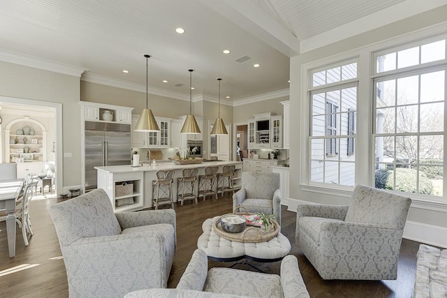 living room with baseboards, visible vents, ornamental molding, dark wood-type flooring, and recessed lighting