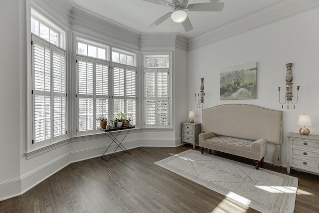 living area with ornamental molding, a wealth of natural light, and wood finished floors