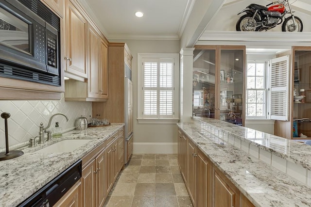 kitchen featuring baseboards, dishwashing machine, crown molding, black microwave, and a sink