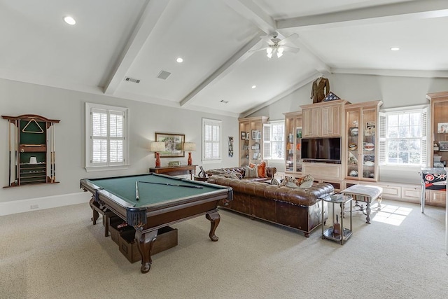 game room with vaulted ceiling with beams, light carpet, and a wealth of natural light