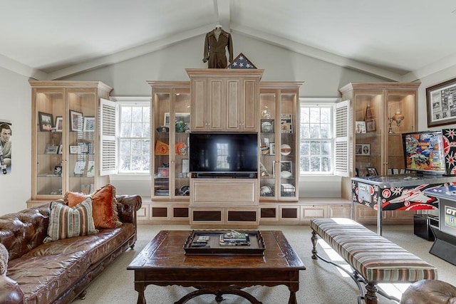 living room featuring lofted ceiling and light carpet