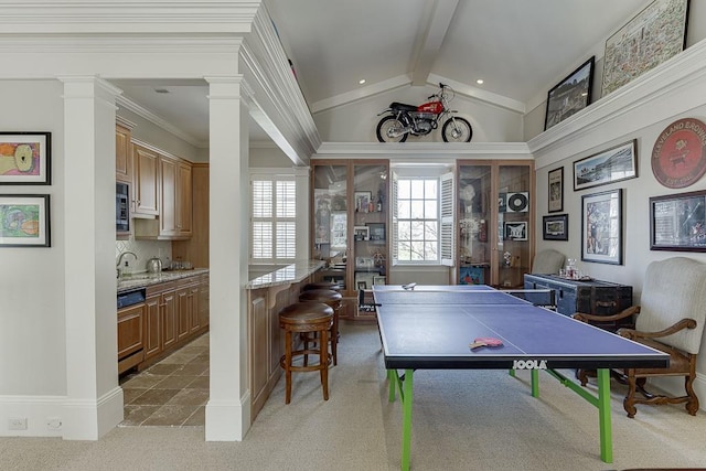 game room with light colored carpet, lofted ceiling with beams, ornate columns, a sink, and recessed lighting