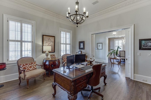 office area featuring a healthy amount of sunlight, wood finished floors, and a notable chandelier