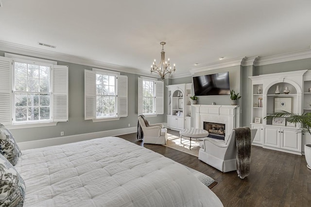 bedroom featuring dark wood-style flooring, a fireplace, visible vents, and crown molding