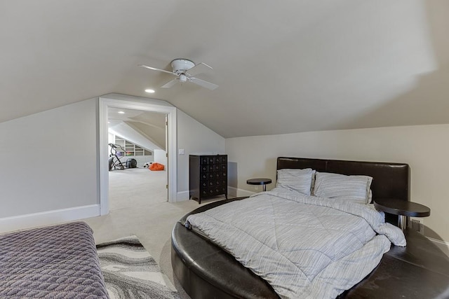 carpeted bedroom featuring a ceiling fan, recessed lighting, vaulted ceiling, and baseboards