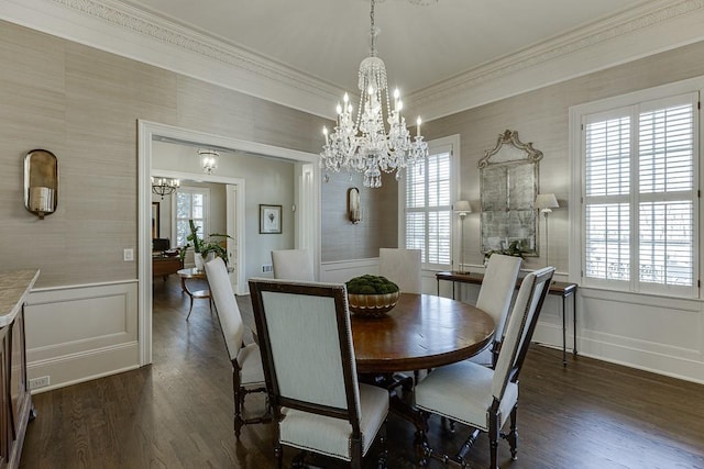 dining space with a chandelier, dark wood-style floors, and a healthy amount of sunlight