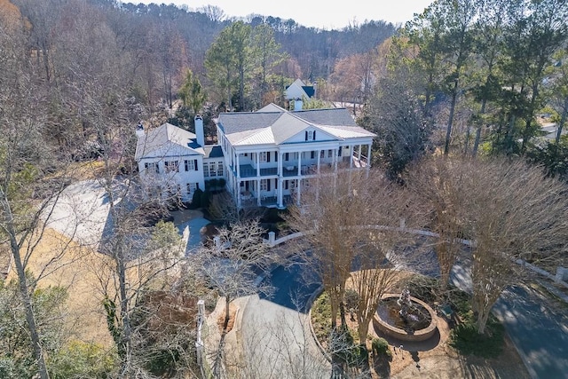 aerial view featuring a view of trees