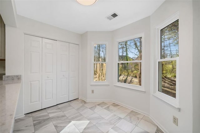 unfurnished bedroom with a closet