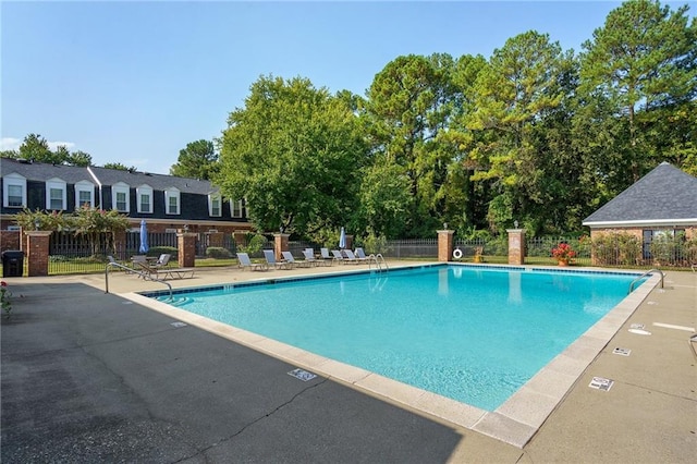 view of pool featuring a patio