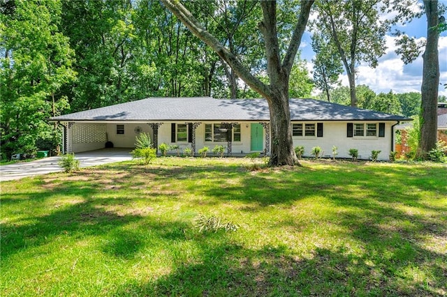 4103 Laynewood Cir, Tucker, GA 30084 - ranch-style home featuring driveway, a front lawn, and a carport