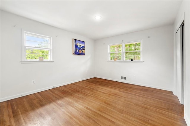 4103 Laynewood Cir, Tucker, GA 30084 - unfurnished bedroom featuring light wood finished floors and a closet
