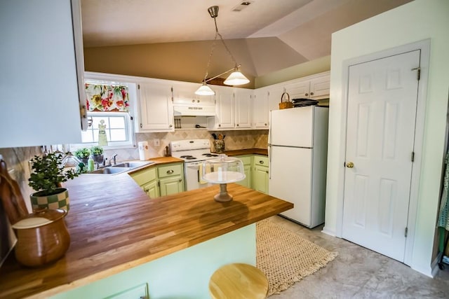 kitchen featuring white appliances, wooden counters, lofted ceiling, a sink, and backsplash