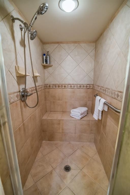 full bathroom featuring a shower stall